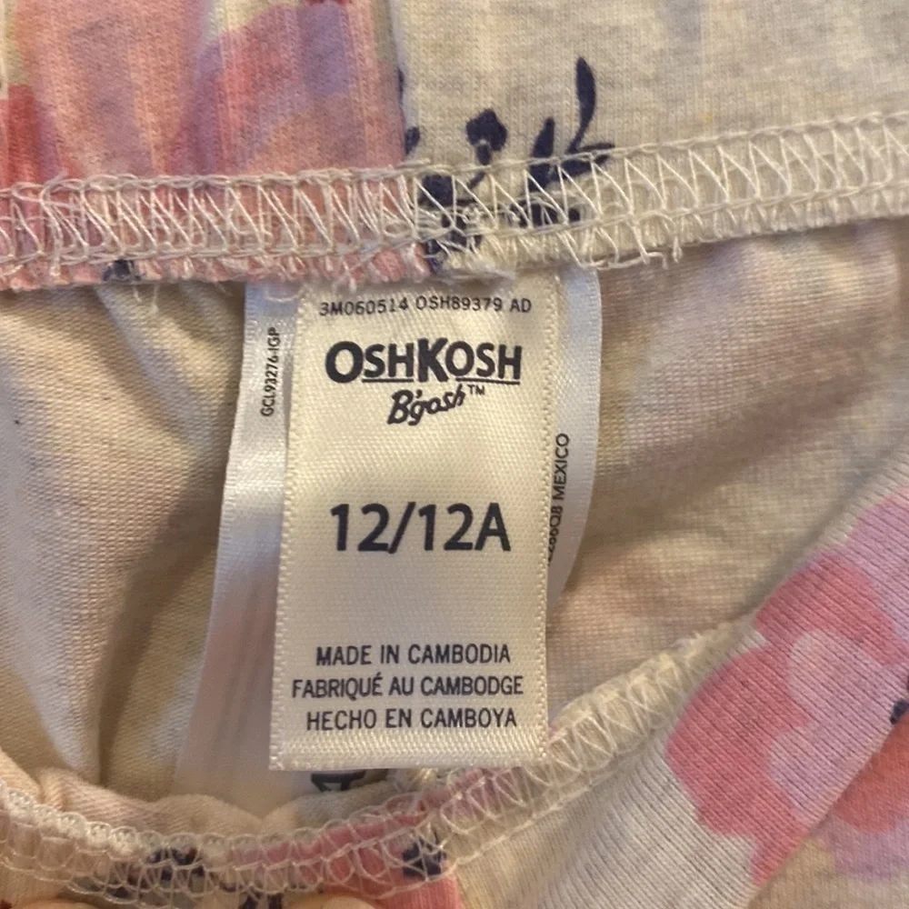 Oshkosh B’gosh - girls leggings. Size 12. Cream with Floral design. NWOT